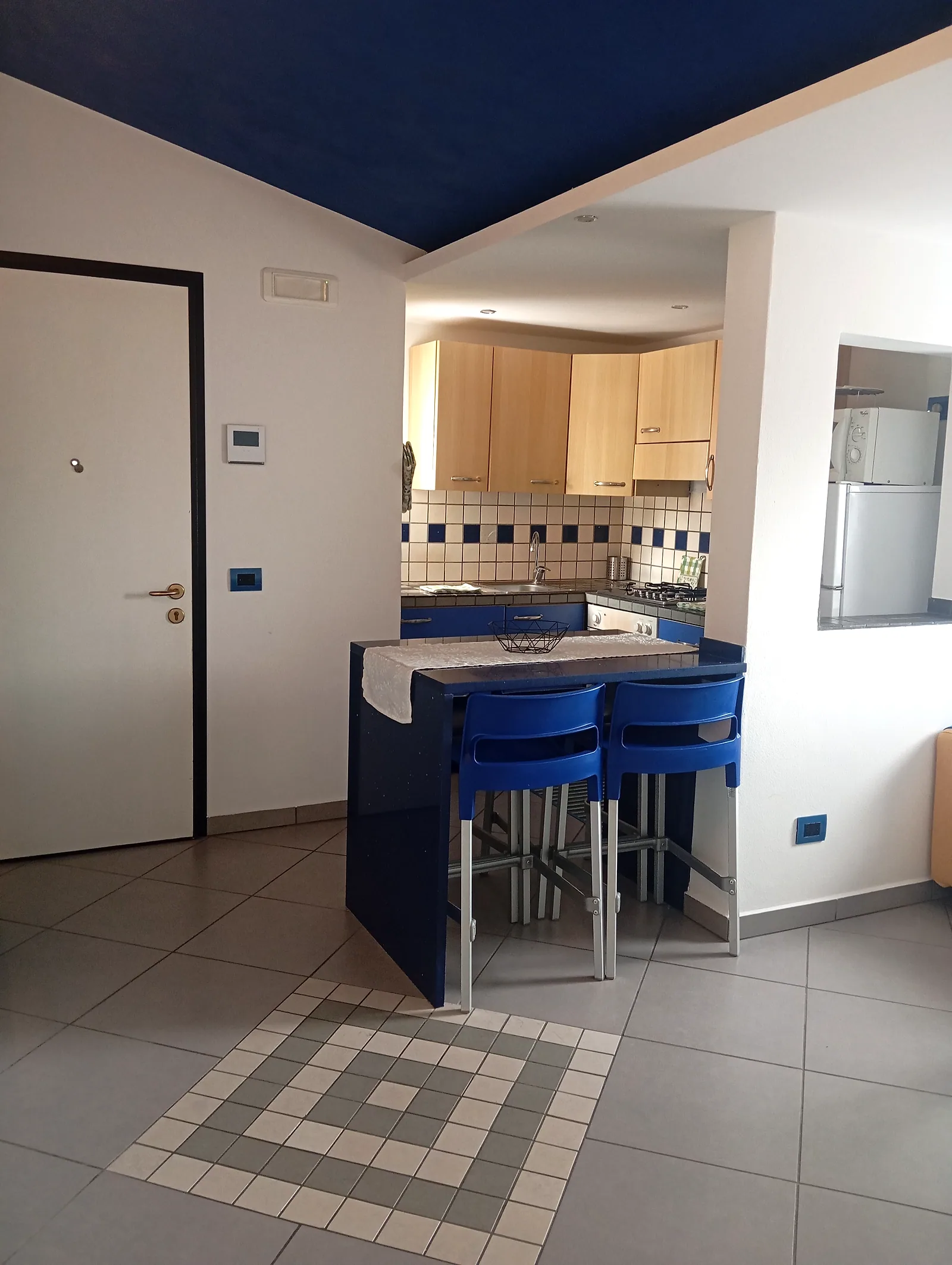 Soggiorno con cucina a vista